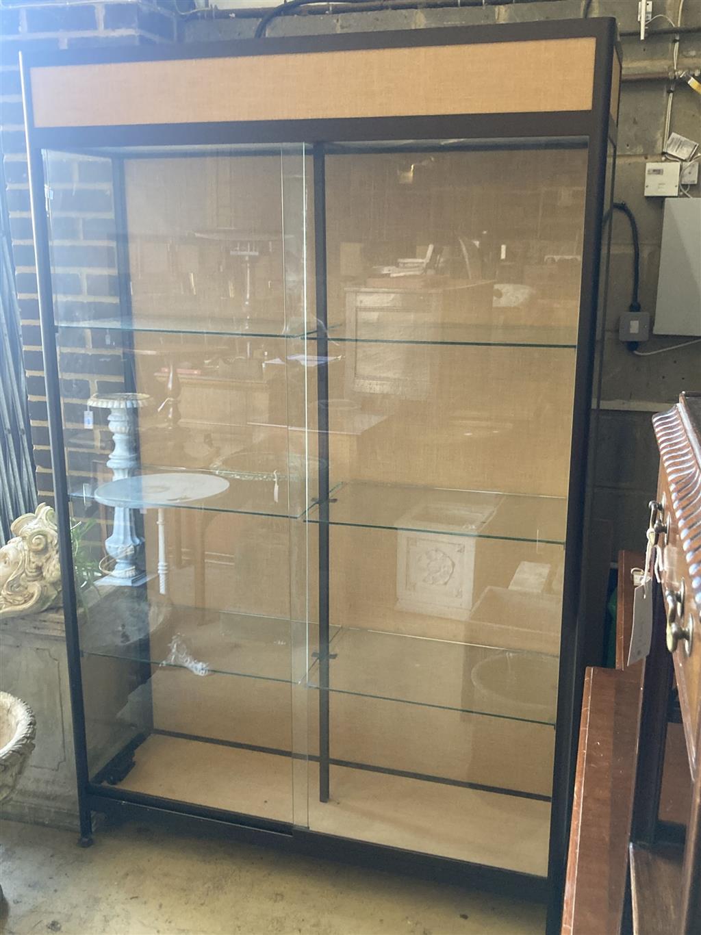 A shop display cabinet, width 128cm, depth 39cm, height 203cm